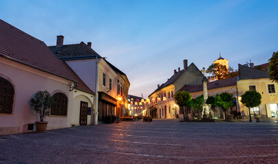 Main square with beautiful city lights in Szentendre Hungary next to Budapest with colorful banner light decorations