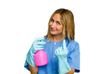 Young cleaner caucasian woman isolated green chroma background pointing with finger at you as if inviting come closer.