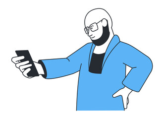 Bearded man looking at smartphone. Video call communication