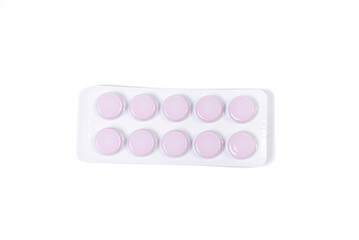 Сapsule pills in blister on a white background