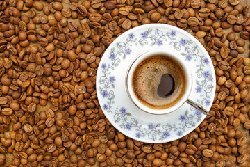 cup of coffee with beans