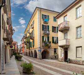 Fototapeta na wymiar Cuneo, Piedmont, Italy - October 14, 2022: Contrada Mondovì, ancient street in the historic center with nineteenth-century buildings with arcades
