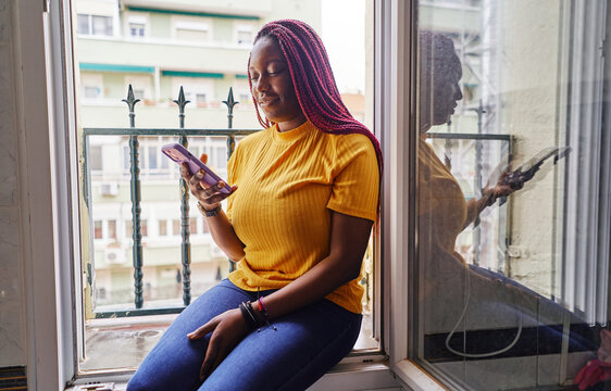 young african american woman, with mobile phone