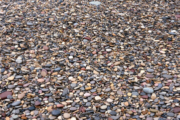 Background of small stones from the beach