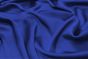 Rich and luxury red silk fabric texture background.