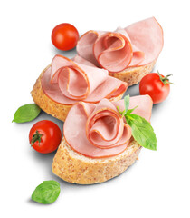 Jamon. Slices of Bread with Spanish Serrano Ham Served as Tapas. Cured ham, spanish appetizer. Prosciutto isolated on white background