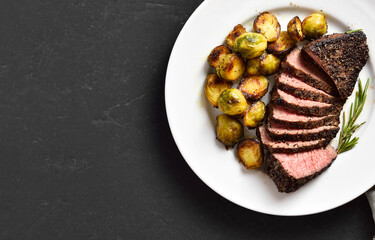 Grilled beef steak with brussels sprouts