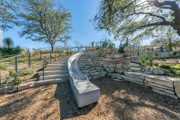 Stairs and slide amid scenic nature views at Waterloo Park in Austin Texas