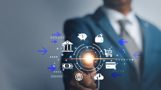 businessman touching virtual screen for futuristic digital processing of biometric identification fingerprint scanner for acess personal financial data.surveillance and security