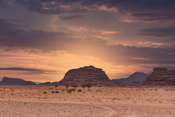 Fototapeta na wymiar The sunset of the Hasmi Neum mountains, Saudi Arabia