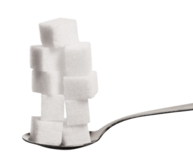 Spoon full of sugar cubes