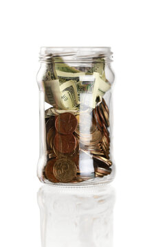 Jar full of money - isolated image