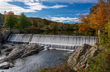 Ottauquechee river flows over weir into hydroelectric power station in Taftsville Vermont