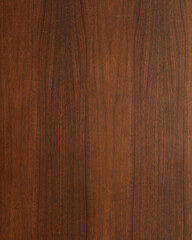 Wood texture background. Walnut surface from a mid-century modern gentleman's chest. Vertical wood...