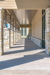 Walkway lined with posts for pedestrians outside a building in Austin Texas