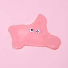Blob slime with goggles on pink background