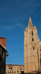 Fototapeta na wymiar Gothic cathedral in Leon. Historic street in the ancient Spanish city in Castile and Leon region