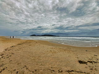 sunset on the beach in Florianópolis