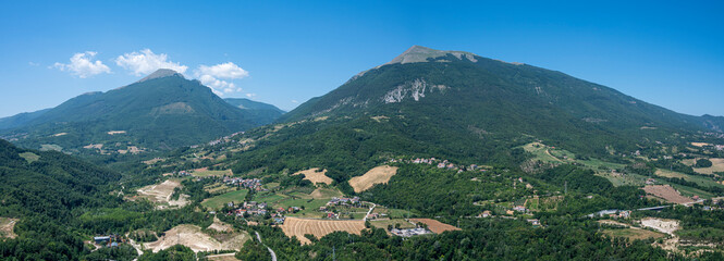 Fototapeta na wymiar Extra wide panorama of the Twin Mountains and the Abruzzo hills