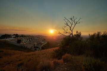 Fototapeta na wymiar beautiful sunset landscape on the hills