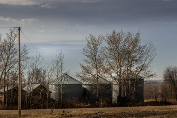 Fototapeta na wymiar Fields marshes rustic out buildings Red Deer County Alberta Canada