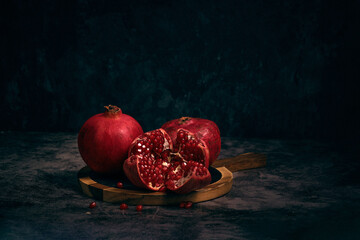 juicy pomegranate on a dark background