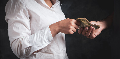 Obraz premium the man gives the girl money