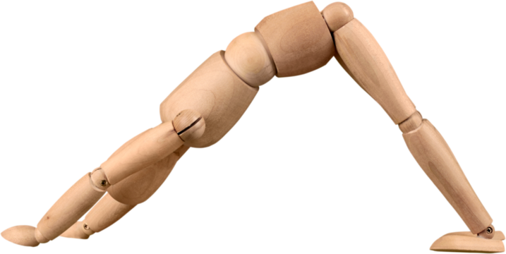 Wooden figurine exercising  on white background