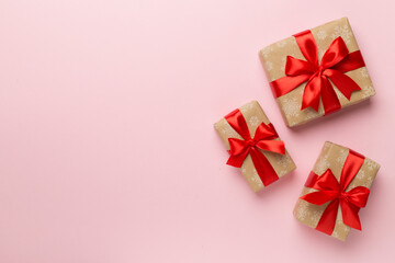 Gift boxes on color background, top view