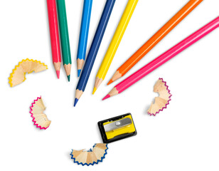 Set of colored pencils of different colors and a sharpener with shavings - obrazy, fototapety, plakaty