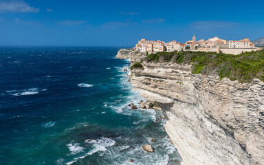 Fototapeta na wymiar Old town of Bonifacio, built on cliff rocks. Corsica, France