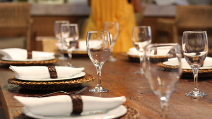 Dining table with cutlery and plates