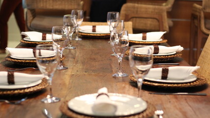 Dining table with cutlery and plates