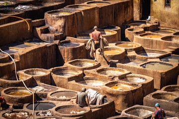 close up of stone vessel in Chouara Tannery, leather, fez el bali, medina, fez, fes, morocco, north...