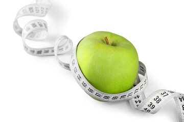 Body Measuring Tape Around A Green Apple