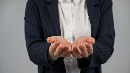 Obraz premium Close-up of caucasian woman holding her palms up. 