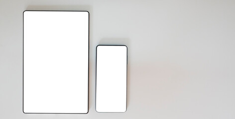 white background smartphone and tablet with white screen.
white screen for text.
mackup idea concept.