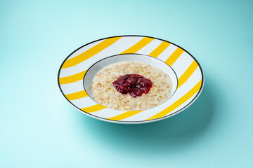 oatmeal in a plate on a colored background