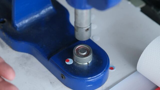 People using eyelet machine