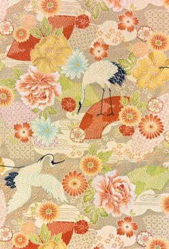 Closeup detailed photograph of a traditional Japanese furoshiki cloth depicting flying tsuru cranes symbol of luck and longevity surrounding by cherry, plum,cosmos,chrysanthemums or roses flowers.