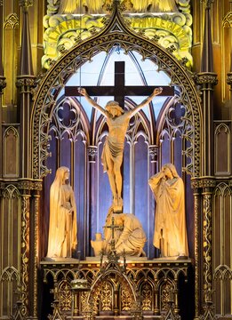 The Privileged Altar with Statue of Crucified Jesus Behind the Main Altar at the Notre-Dame de Montreal Basilica in Old Montreal, Quebec