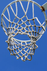 netball goal hoop against blue sky