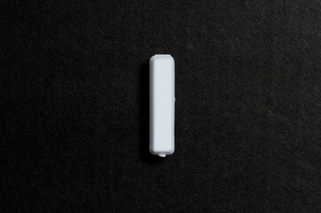 Letter I on a black background