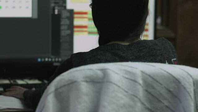 Young Female Office Employee Performs Tasks at Her Desk 4K