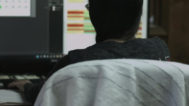 Young Female Office Employee Performs Tasks at Her Desk 4K