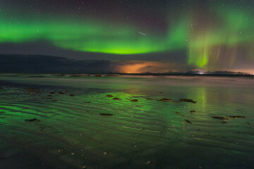 Fototapeta na wymiar Beautiful colorful northern lights captured in the Lofoten Islands in northern Norway.