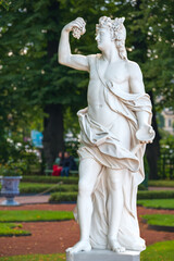 Statue of Greek God Bacchus in Summer garden in Saint Petersburg, Russia