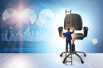 Businessman in the career concept climbing chair