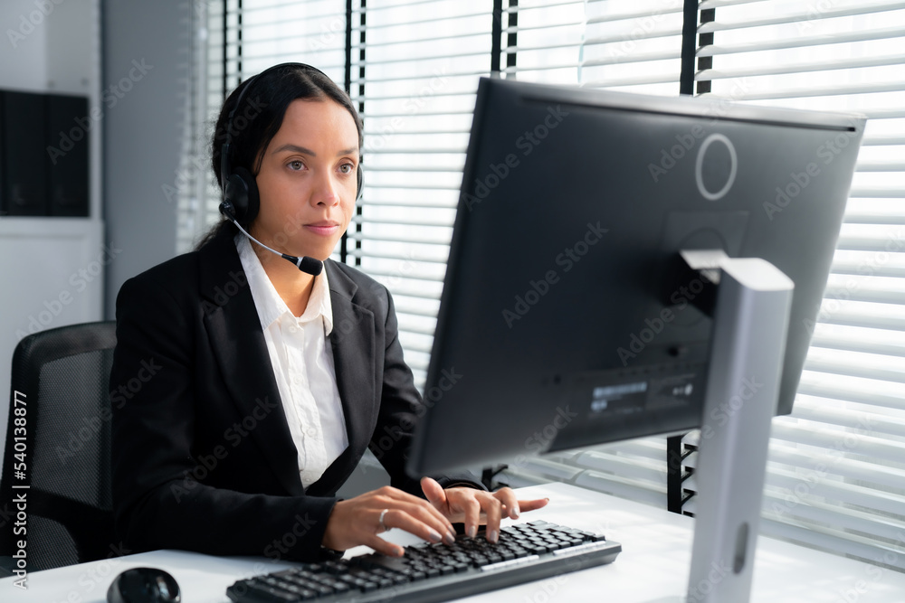 Aufkleber competent female operator working on computer and talking with clients. concept relevant to both cal