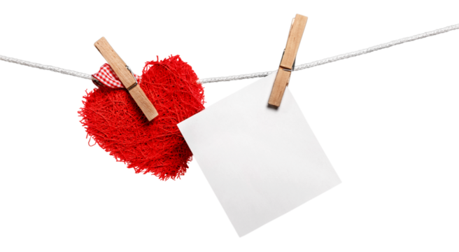 Red decorative heart and white card on rope on  white background